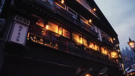 Slow-revealing-shot-of-evening-in-Ginzan-Onsen,-hot-spring-and-ryokan-town-in-northern-japan