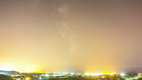 Timelapse-of-celestial-Milky-Way,-stargaze-in-southernmost-Spain-city,-Malaga-nightlife