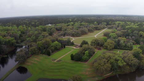Aerial-high-panning-shot-of-historic-Middleton-Place-Plantation-along-the-Ashley-River-in-low-country-South-Carolina