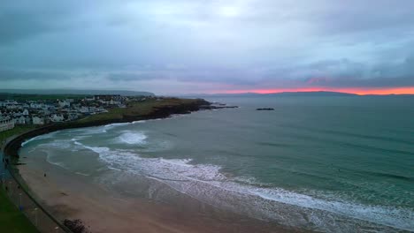 Red-sky-overlooking-a-beach-on-a-moody-day