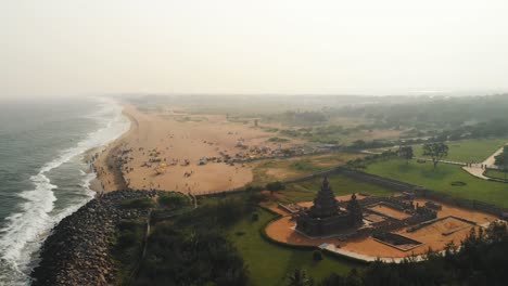 Aerial-View-Across-Shore-Temple-And-Beach-In-Chennai-During-Sunset
