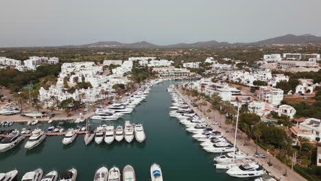 Mediterranean-marina-with-yachts-and-white-buildings