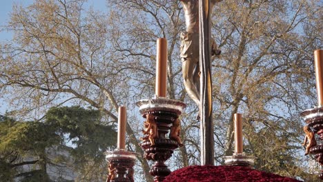 Closeup-backview-of-catholic-parade-carriage-with-Jesus-Christ-on-cross