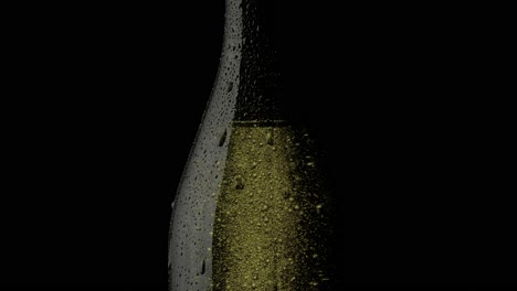Champagne-bottle,-catching-and-reflecting-light-on-its-glassy-surface,-illuminating-the-tiny-sparks-and-bubbles-within