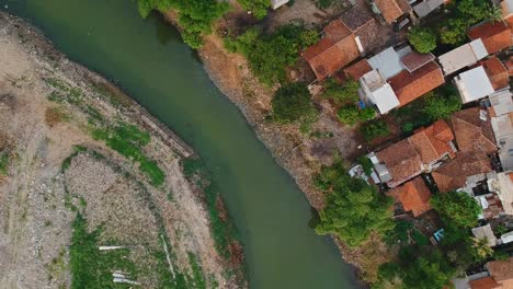Aerial-Top-view-over-Citarum-River-at-low-tide,-in-Bandung-City,-Indonesial