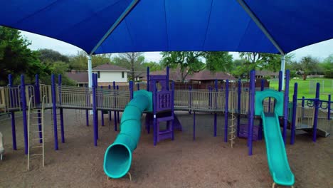 Aerial-footage-of-a-playground-for-the-Highland-Village-Elementary-School-in-Highland-Village-Texas