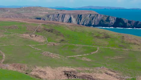 A-4K-Reveal-shot-above-Mizen-Head-of-Browhead-looking-East-towards-Crookhaven