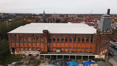 Red-brick-building-abandoned,-aerial-drone-view