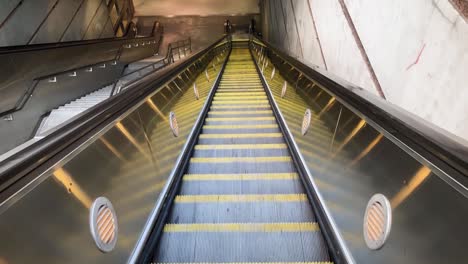 An-escalator-going-down-into-the-subway-station-in-Los-Angeles