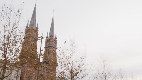 Dynamic-shot-from-medieval-towers-to-city-pedestrians-in-Antwerp