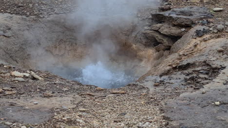 Boiling-Water-in-Geyser,-Geothermal-Area-in-Landscape-of-Iceland