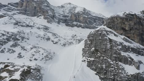 Icy-ski-slope-in-the-rugged-Cortina-Tofane-mountain,-Italian-Dolomites