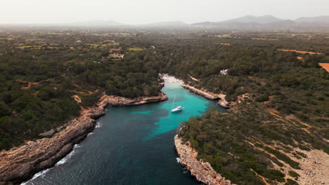 Aerial-view-of-a-secluded-cove-in-Cala-Sa-Nau,-Mallorca