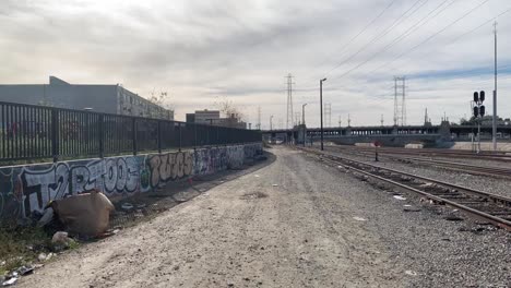 Train-tracks-in-downtown-Los-Angeles-leading-to-bridge