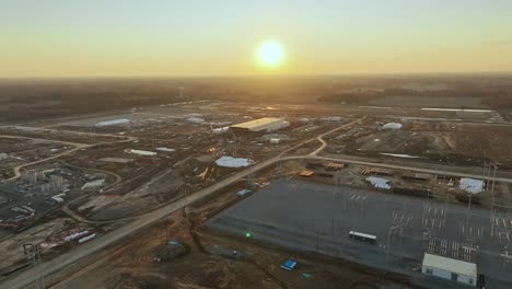 Aerial-pull-away-of-Ford's-Megacampus,-BlueOval-City-at-Sunset-in-Stanton,-TN