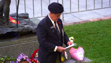 President-Phil-Ainsworth-giving-speech-to-the-veterans-and-families,-paying-tribute-and-highest-respect-to-those-who-served-and-sacrificed-at-Brisbane's-Anzac-Square-during-the-day,-close-up-shot