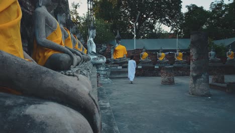 Buddhist-nun-walks-in-old-temple-in-Ayutthaya