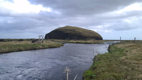 River,-Volcanic-Hill-and-Pastures,-Landscape-of-Iceland