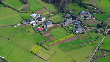 Houses-On-Field-In-Spanish-Village-In-A-Fonsagrada,-Lugo,-Spain