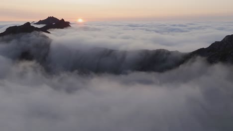 Aerial-view-of-Segla-mountain-above-the-sky,-Norway-during-summer