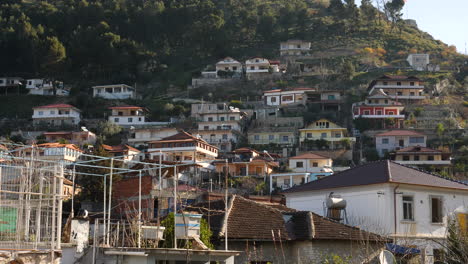 UNESCO-Town-Berat-with-Old-Houses-in-Mountain,-Albania,-Tilt-Up