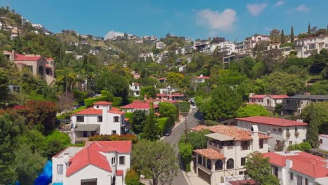 Flying-Over-Upscale-Southern-California-Mansions-in-Trousdale-Estates,-Los-Angeles-on-Sunny-Afternoon