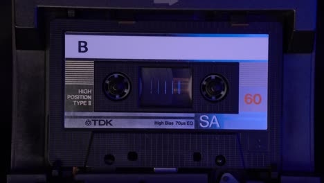TDK-Audio-Cassette-Tape-Playing-From-Start-in-Vintage-Deck-Player-From-1980's