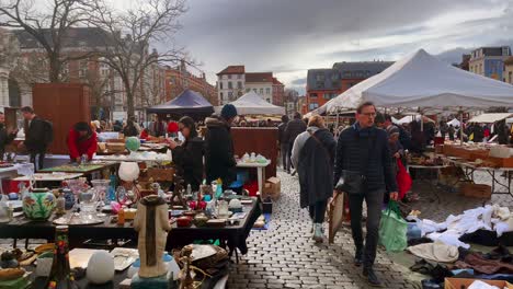 Weekend-flea-market-bustling-with-shoppers-in-Brussels