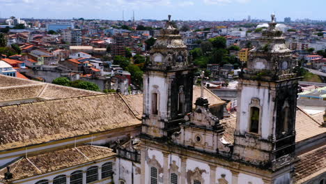 Aerial-view-of-a-top-of-a-church-close-to-Pelourinho,-Salvador,-Bahia,-Brazil