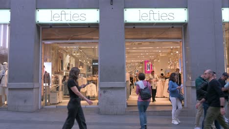 Customers-and-pedestrians-are-seen-shopping-at-the-Spanish-fashion-brand-owned-by-Inditex,-Lefties,-store-in-Spain