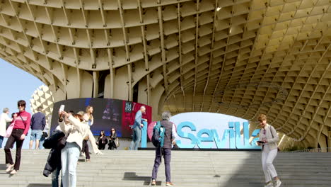 Timelapse-of-tourists-and-locals-spending-leisure-time-at-the-Spanish-cultural-landmark-Metropol-Parasol-at-La-Encarnacion-square