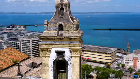 Aerial-view-of-a-top-of-a-church-close-to-Pelourinho,-Salvador,-Bahia,-Brazil