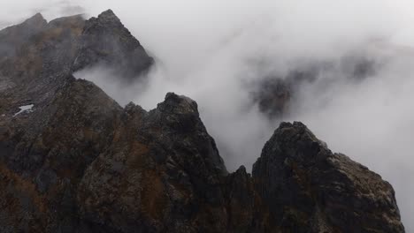 Aerial-view-of-Segla-mountain-above-the-sky,-Norway-during-summer