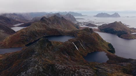 Aerial-view-of-Segla-mountain-above-the-sky,-Norway-during-summer