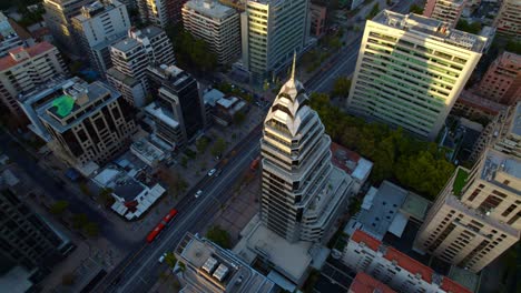 Aerial-view-around-the-Edificio-Apoquindo-3039-high-rise-in-sunny-Las-Condes,-Chile