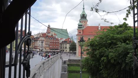 The-old-square-and-the-view-of-the-Royal-Castle-admired-by-visitors-walking-along-the-street