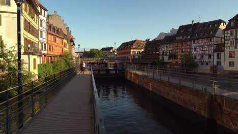 La-Petite-France-is-the-Strasbourg-lively-tourist-hub,-known-for-cobblestone-streets,-canals,-and-well-preserved-half-timbered-homes