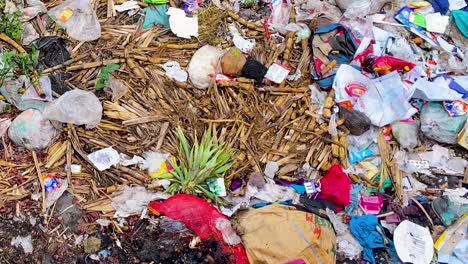 Waste-polluted-soil-non-recyclable-plastic-environment-Dhaka-Bangladesh