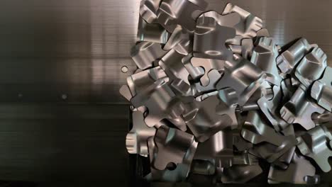 An-industrial-conveyor-belt-with-metal-scrap-in-a-metal-processing-company