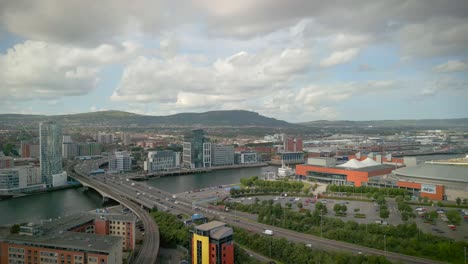 Wide-aerial-shot-travelling-in-reverse-over-Belfast-City-Centre