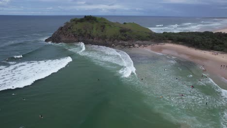 Surfers-At-Cabarita-Beach-Near-Norries-Headland-And-Cove-In-New-South-Wales,-Australia