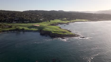 Aerial-View-Of-Pebble-Beach-Hole-7-Golf-Course-At-Sunrise-In-California,-USA