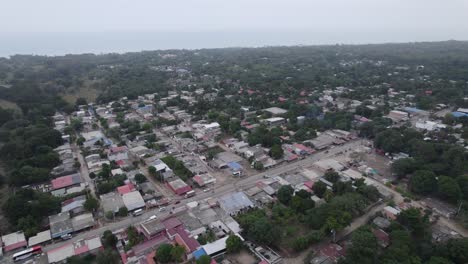 Vista-Aérea,-Parte-Habitada-De-La-Ciudad-De-Palomino-Rodeada-De-Naturaleza-En-Desaparición.