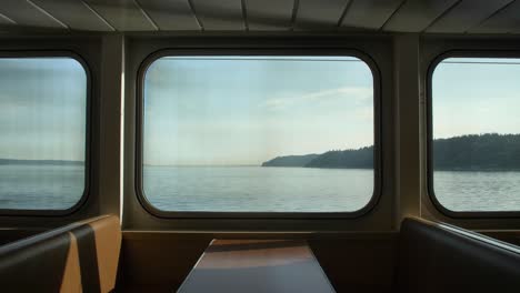 Empty-booth-with-a-table-on-the-Whidbey-Island-ferry-in-Washington-State