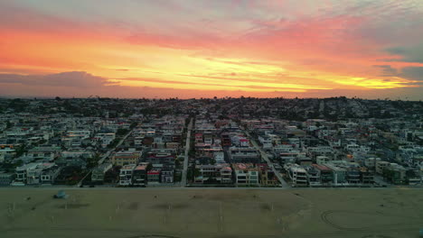 Manhattan-Beach,-California,-USA---A-Beautiful-Sight-of-Coastal-Residences-at-Sunset---Aerial-Panning-Shot