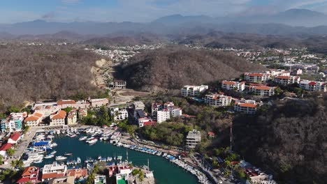 Drone's-eye-view-of-the-town-of-Huatulco,-Oaxaca,-Mexico