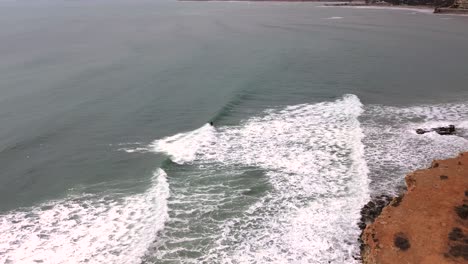 Surfing-waves-drone-view