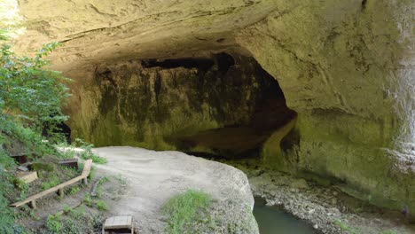 A-tourist-destination-near-Vratsa-in-Bulgaria,-frequented-for-its-historical-significance-and-a-speological-site-for-its-natural-rock-formations-and-subterranean-streams-in-Gods-Bridge-cave