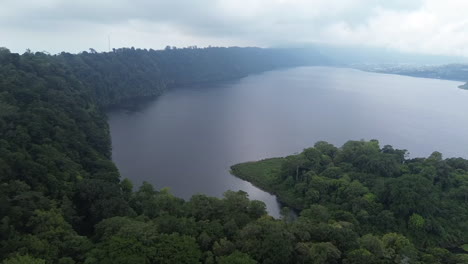 Aerial-shot-of-Early-morning-lake-Buyan-in-Bali-with-low-clouds