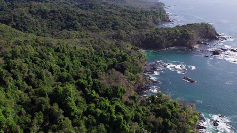 Slow-establishing-shot-of-the-shoreline-with-dense-woodlands-at-Cebaco-Island